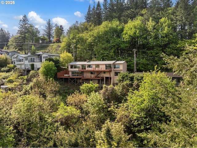 3110 NW Monte Vista Ter, Portland, OR 97210 - rear view of house with a wooden deck
