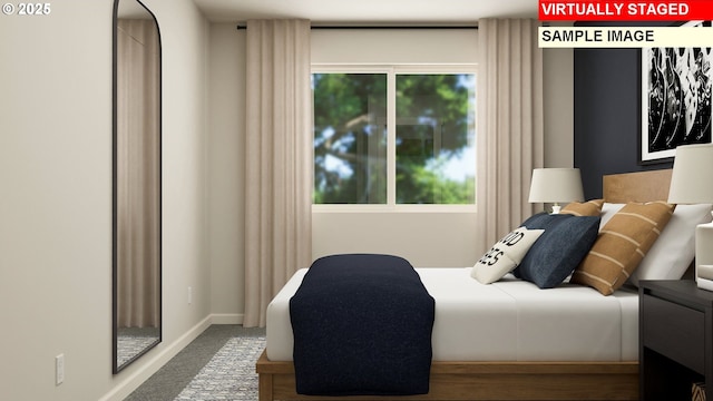 bedroom featuring multiple windows and carpet floors