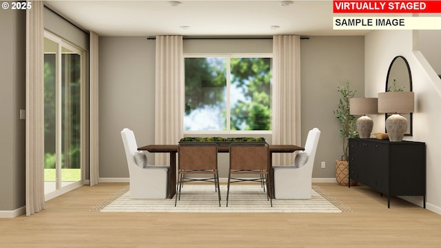 dining space featuring light hardwood / wood-style flooring