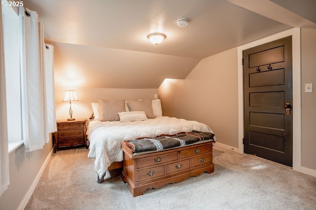 301 W Walnut St, Winlock, WA 98596 - bedroom with light carpet, baseboards, and vaulted ceiling