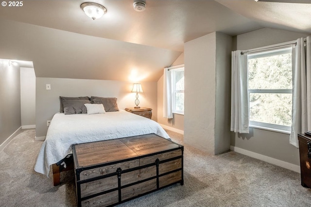 301 W Walnut St, Winlock, WA 98596 - bedroom featuring vaulted ceiling, carpet, and baseboards