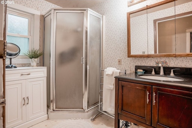 301 W Walnut St, Winlock, WA 98596 - full bath with wallpapered walls, vanity, and a stall shower