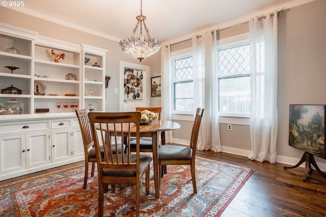 301 W Walnut St, Winlock, WA 98596 - dining room with dark wood-style flooring, baseboards, and a chandelier
