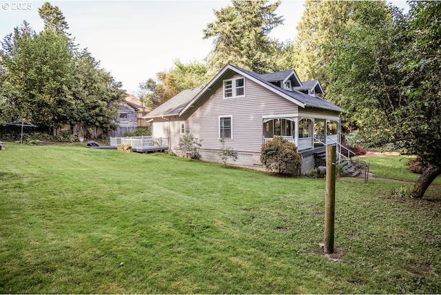 301 W Walnut St, Winlock, WA 98596 - view of home's exterior featuring a lawn and covered porch