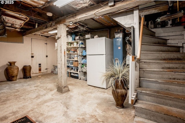 301 W Walnut St, Winlock, WA 98596 - unfinished basement with freestanding refrigerator and stairs
