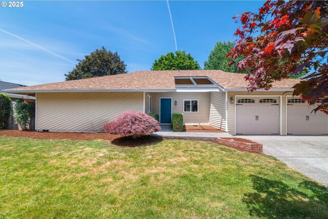 2235 SE Willow Ct, Hillsboro, OR 97123 - view of front facade with a garage, concrete driveway, a front lawn, and roof with shingles