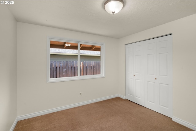 2235 SE Willow Ct, Hillsboro, OR 97123 - unfurnished bedroom featuring carpet flooring and a closet