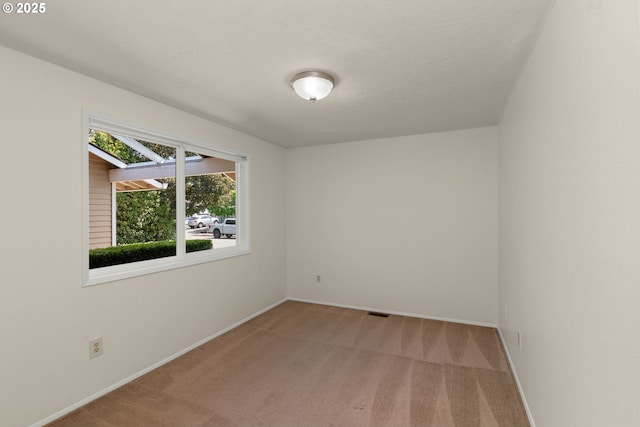 2235 SE Willow Ct, Hillsboro, OR 97123 - empty room featuring light colored carpet and baseboards