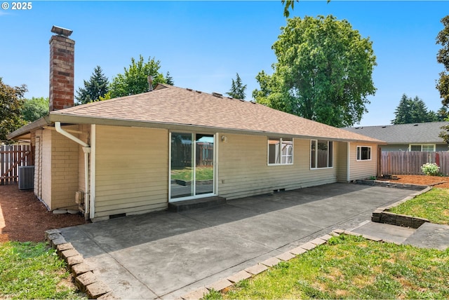 2235 SE Willow Ct, Hillsboro, OR 97123 - rear view of property featuring a chimney, a patio area, and roof with shingles