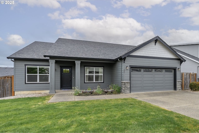 view of front of property with concrete driveway, a garage, and a shingled roof
