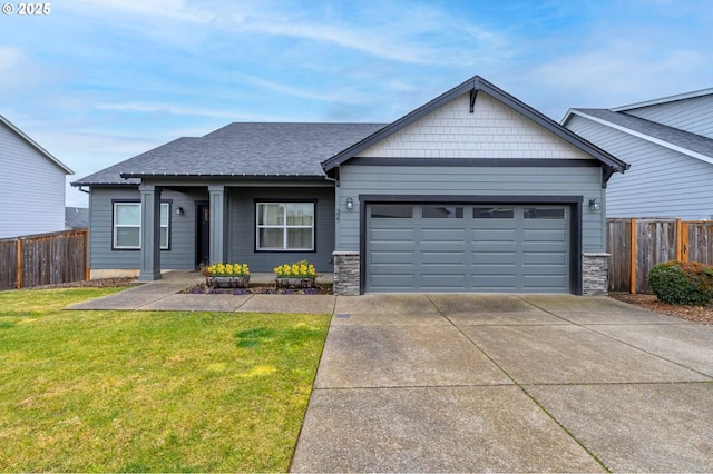 ranch-style home featuring a garage, driveway, and a shingled roof