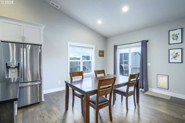 dining space featuring vaulted ceiling, dark wood-type flooring, recessed lighting, and baseboards