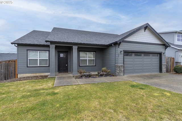 ranch-style home with driveway, a garage, roof with shingles, and stone siding