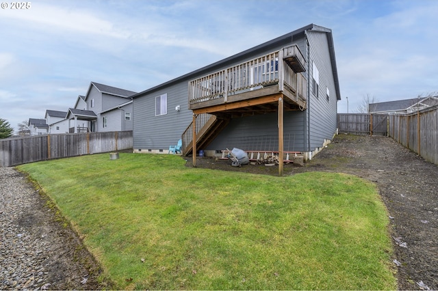 rear view of house featuring a deck and stairway