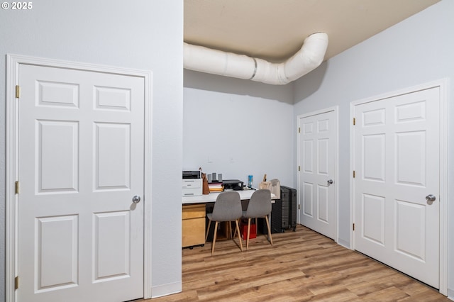 office area featuring light wood-style flooring