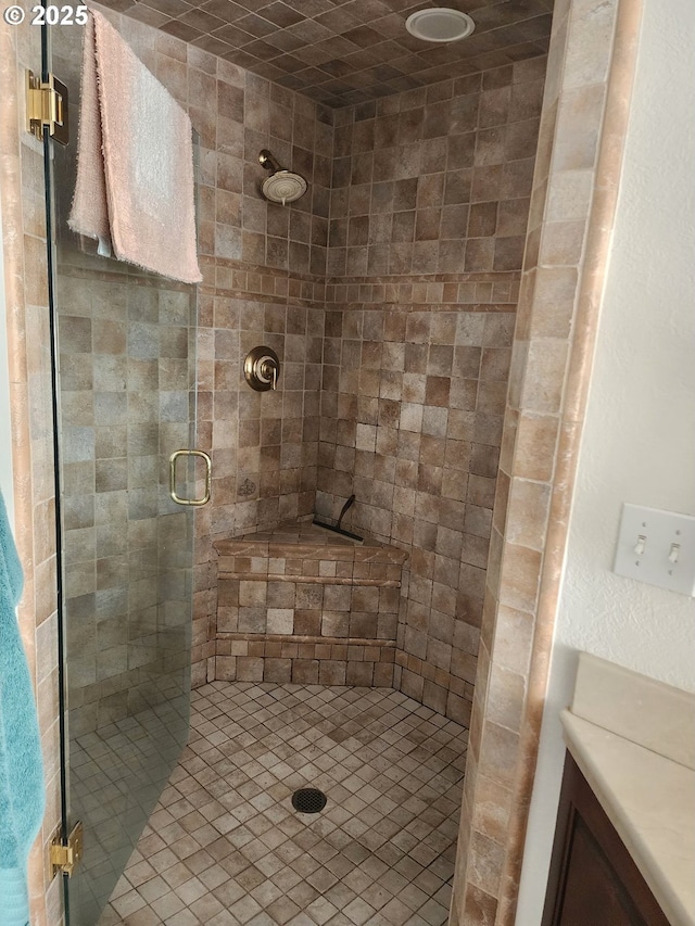 full bathroom featuring a shower stall