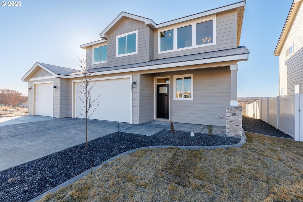 view of front of property with a garage