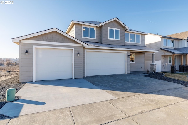 view of front of home with a garage