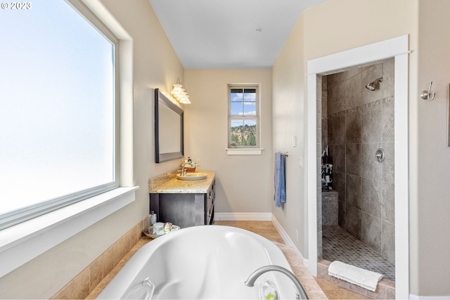 bathroom featuring plus walk in shower and vanity