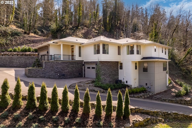 view of front of home with a garage