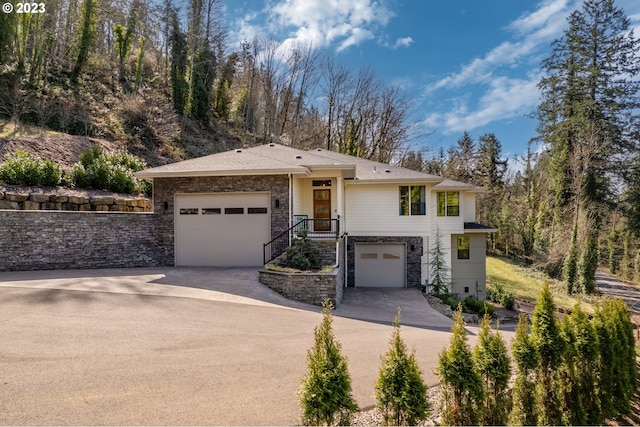 view of front of property with a garage