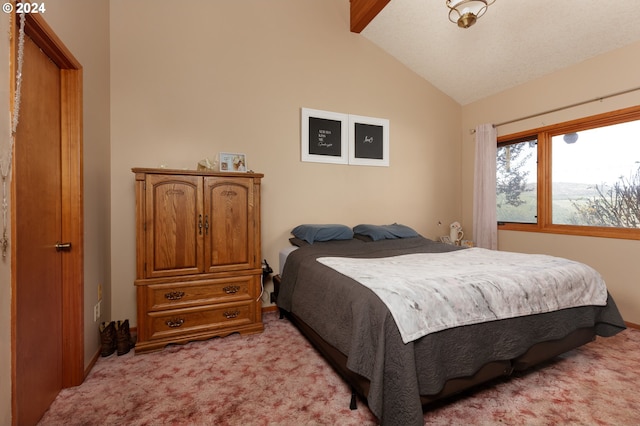 bedroom with light carpet and lofted ceiling with beams