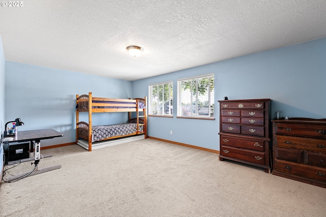 1062 Applegate Pl, Harrisburg, OR 97446 - carpeted bedroom with a textured ceiling and baseboards