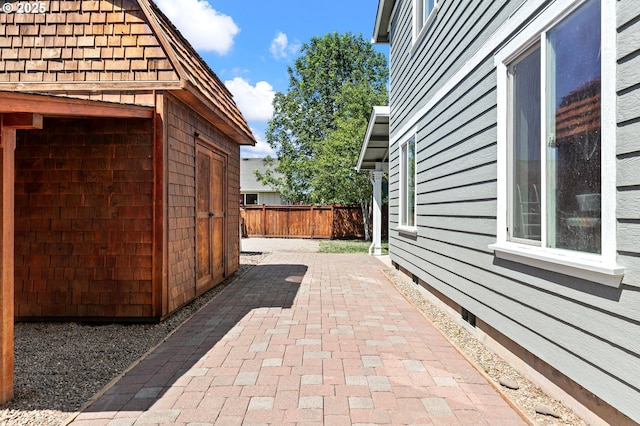1062 Applegate Pl, Harrisburg, OR 97446 - view of patio / terrace featuring an outbuilding