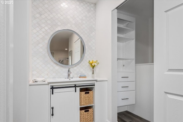 bathroom with backsplash and vanity