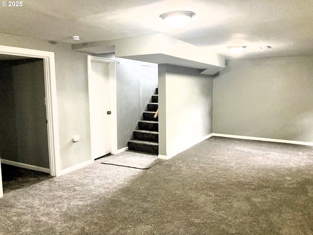 703 Cowlitz Way, Kelso, WA 98626 - finished basement with carpet floors, stairway, and a textured ceiling