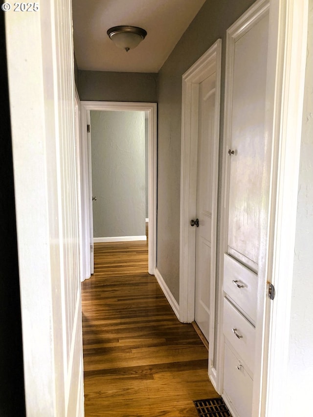 703 Cowlitz Way, Kelso, WA 98626 - corridor with dark wood-type flooring and baseboards