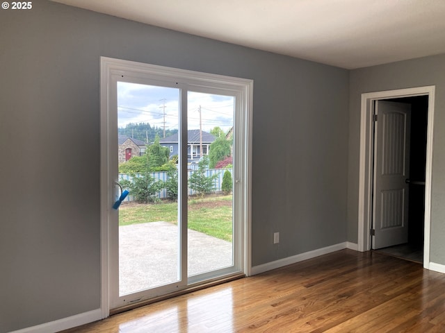 703 Cowlitz Way, Kelso, WA 98626 - unfurnished room with wood finished floors and baseboards