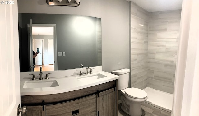 703 Cowlitz Way, Kelso, WA 98626 - bathroom featuring double vanity and a tile shower