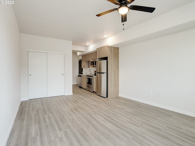 4738 SE Belmont St, Portland, OR 97215 - interior space with ceiling fan and light wood-type flooring