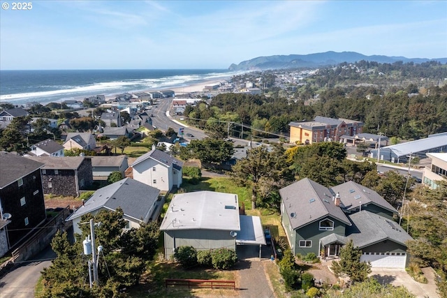 aerial perspective of suburban area with a large body of water