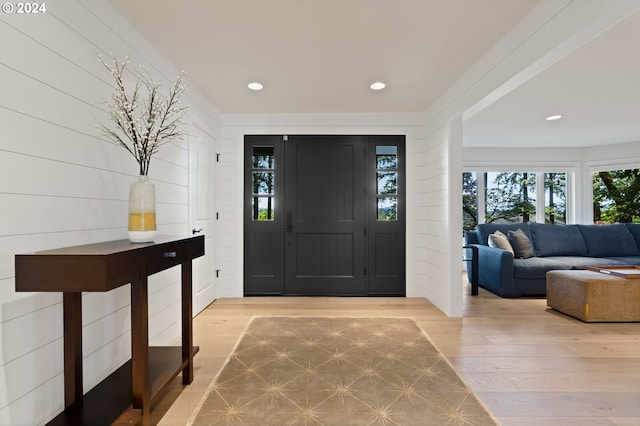 foyer featuring recessed lighting and wood finished floors