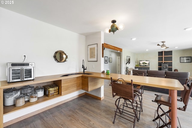 53310 Morrison Rd, Bandon, OR 97411 - kitchen with wood finished floors, recessed lighting, and ceiling fan