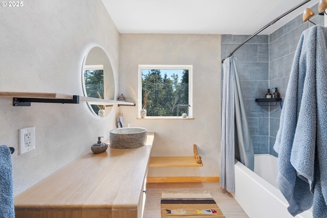 53310 Morrison Rd, Bandon, OR 97411 - bathroom with vanity, shower / bath combo with shower curtain, and wood finished floors