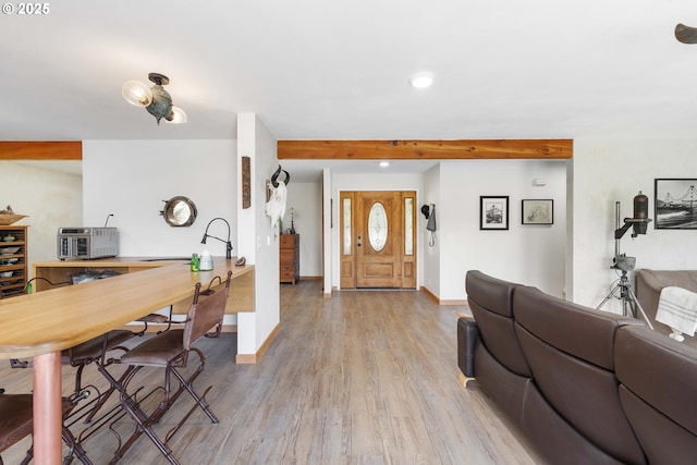 53310 Morrison Rd, Bandon, OR 97411 - entryway featuring light wood-type flooring, recessed lighting, and beam ceiling