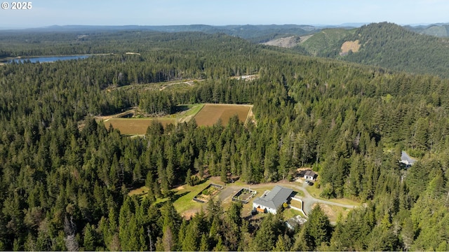 53310 Morrison Rd, Bandon, OR 97411 - aerial view of property's location featuring a heavily wooded area and a water and mountain view