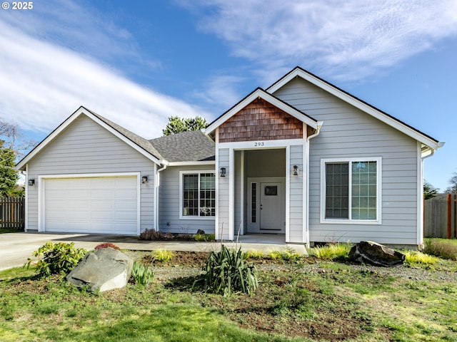 293 W Kershul Cir, Gearhart, OR 97138 - single story home with a garage, driveway, and a shingled roof
