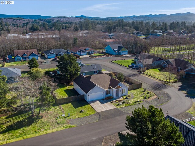 293 W Kershul Cir, Gearhart, OR 97138 - aerial perspective of suburban area with mountains
