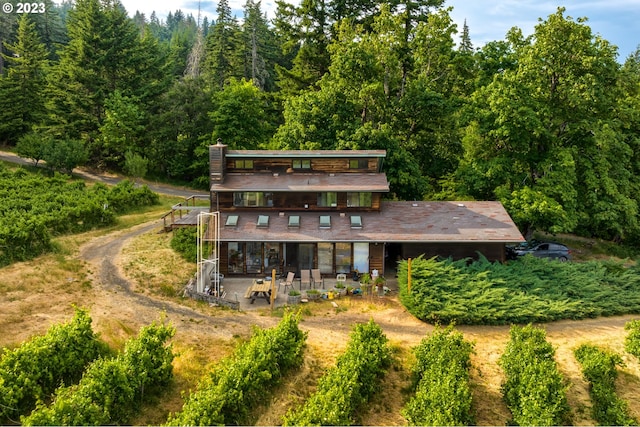 back of property featuring a patio