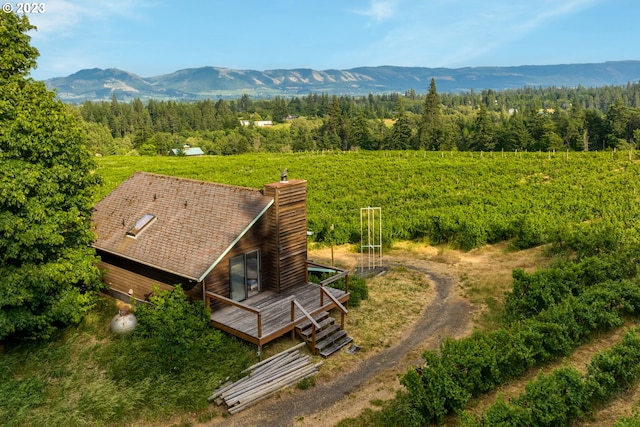 birds eye view of property with a mountain view