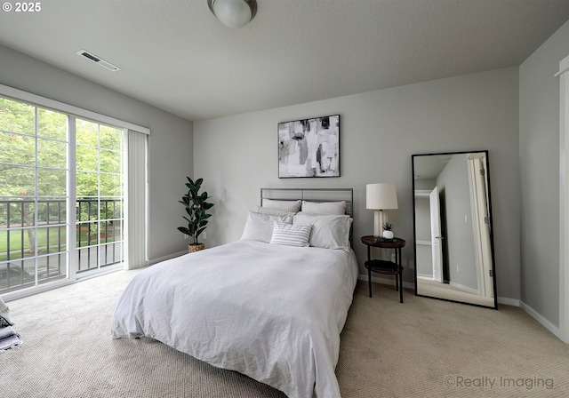 728 NE 72nd Ave, Hillsboro, OR 97124 - carpeted bedroom with access to exterior and baseboards
