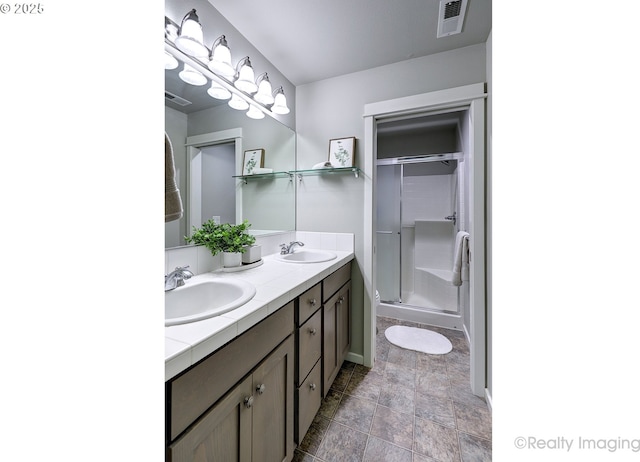 728 NE 72nd Ave, Hillsboro, OR 97124 - full bathroom with double vanity, a stall shower, and stone finish flooring
