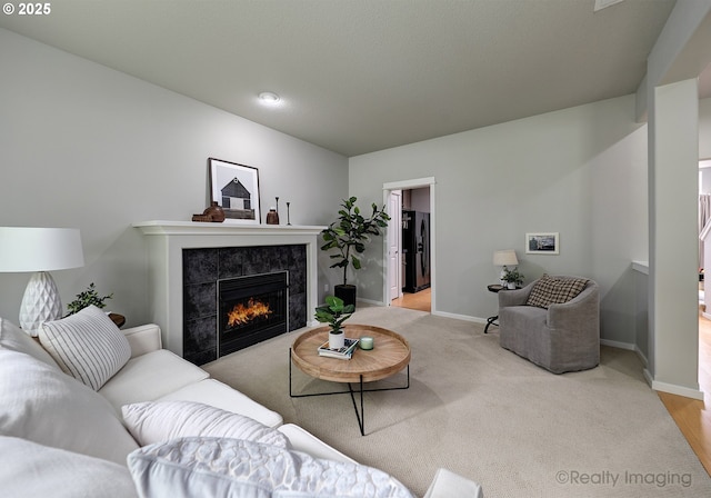 728 NE 72nd Ave, Hillsboro, OR 97124 - living room featuring a tile fireplace and light carpet
