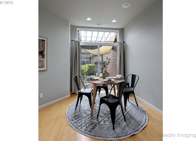 728 NE 72nd Ave, Hillsboro, OR 97124 - dining area with light wood-type flooring and recessed lighting