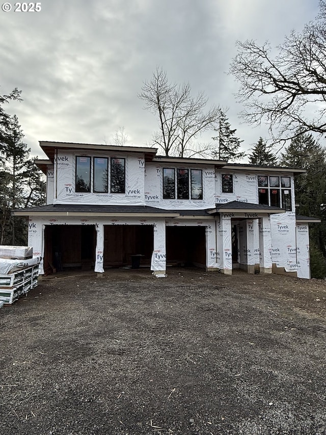 property in mid-construction featuring a garage