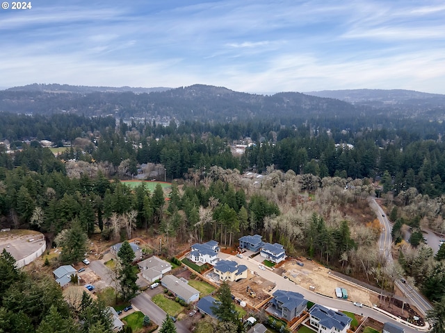 5010 Park Bluff Pl, Lake Oswego, OR 97035 - aerial view of property and surrounding area featuring a forest and a mountainous background